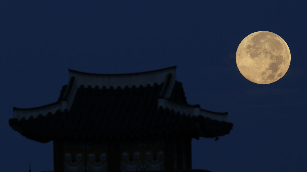 Supermoon rises behind Hwaseong Fortress in Suwon